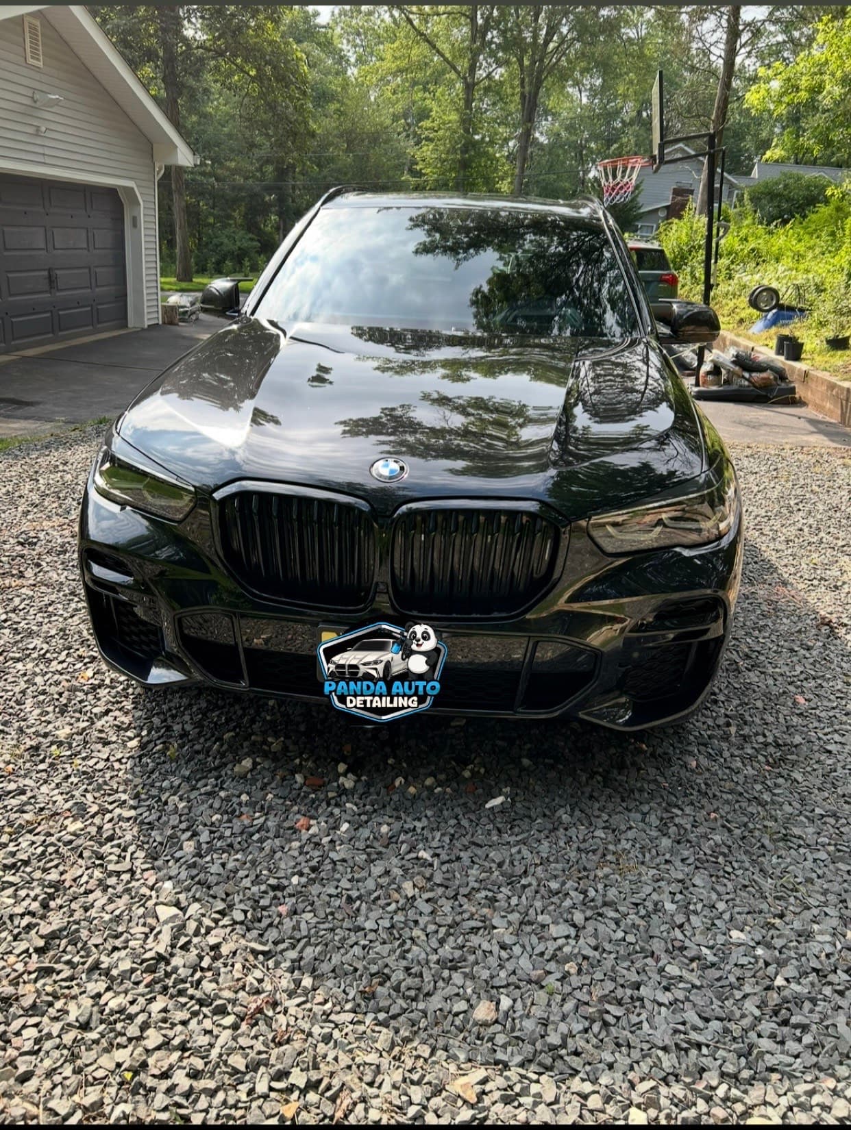 Black BMW X5 after a full exterior detail, deep gloss finish