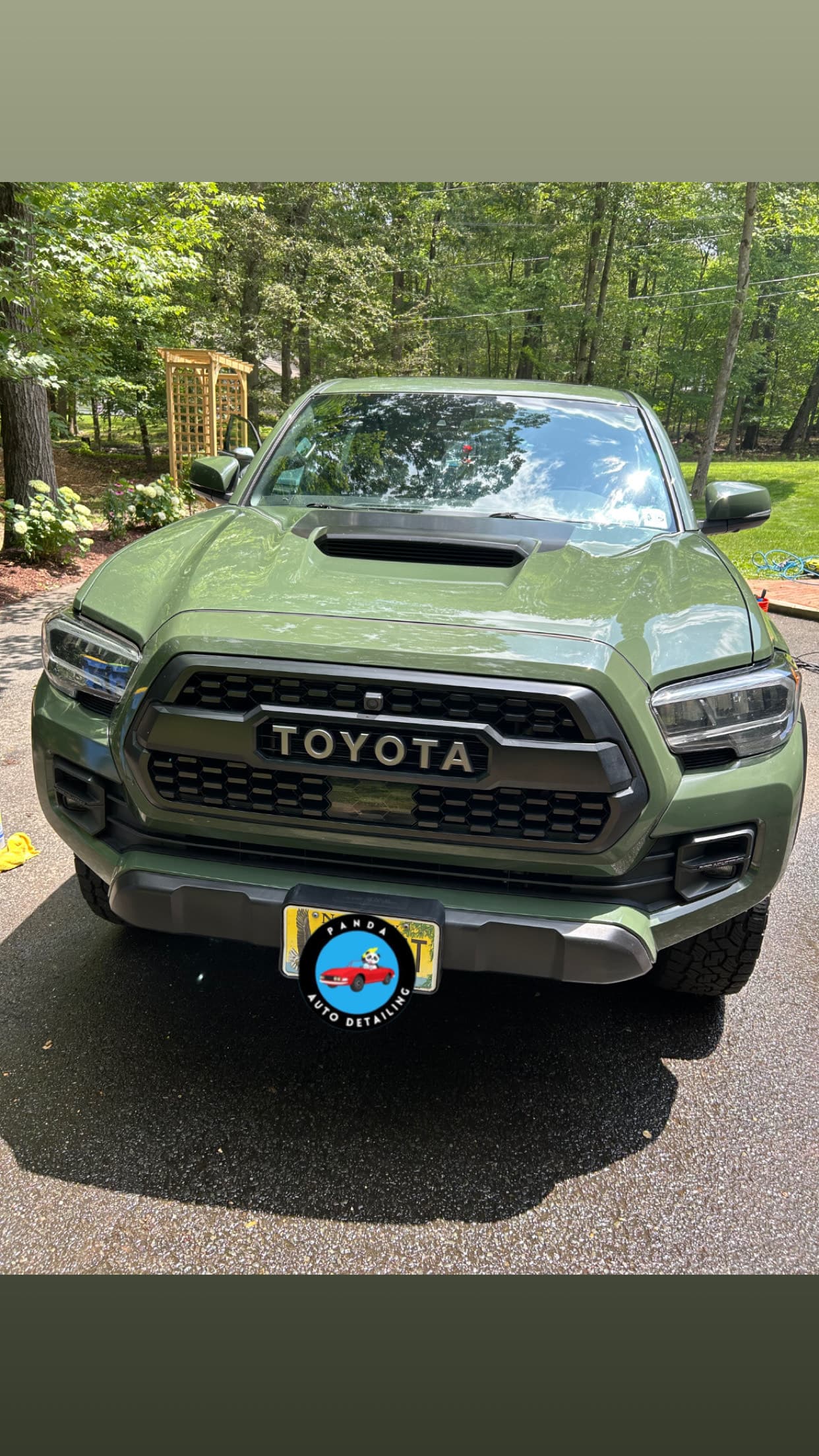 Green Toyota Tacoma TRD after an exterior detail
