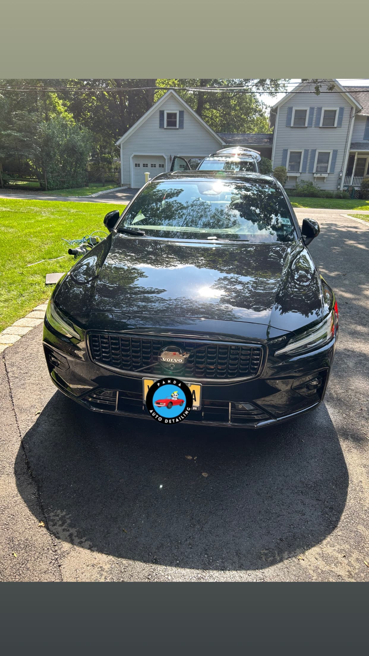 Black Volvo S60 after an exterior detail, deep reflective shine